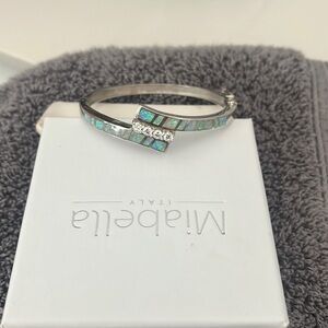 Sterling Silver with Stone & Rhinestone.